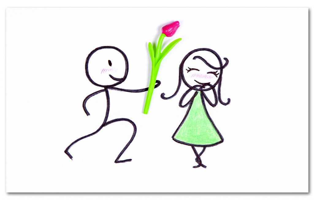 Eine Männliche Zeichenfigur übergibt einer anderen Figur eine Rose